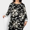 Odziez maloma Tuniki Asymetryczne | Milutka Tunika Plus Size Lekko Dluzszy Tyl Okragly Dekolt Oversize Wzor Kwiaty Ruzan Czarny/Bialy/Bezowy